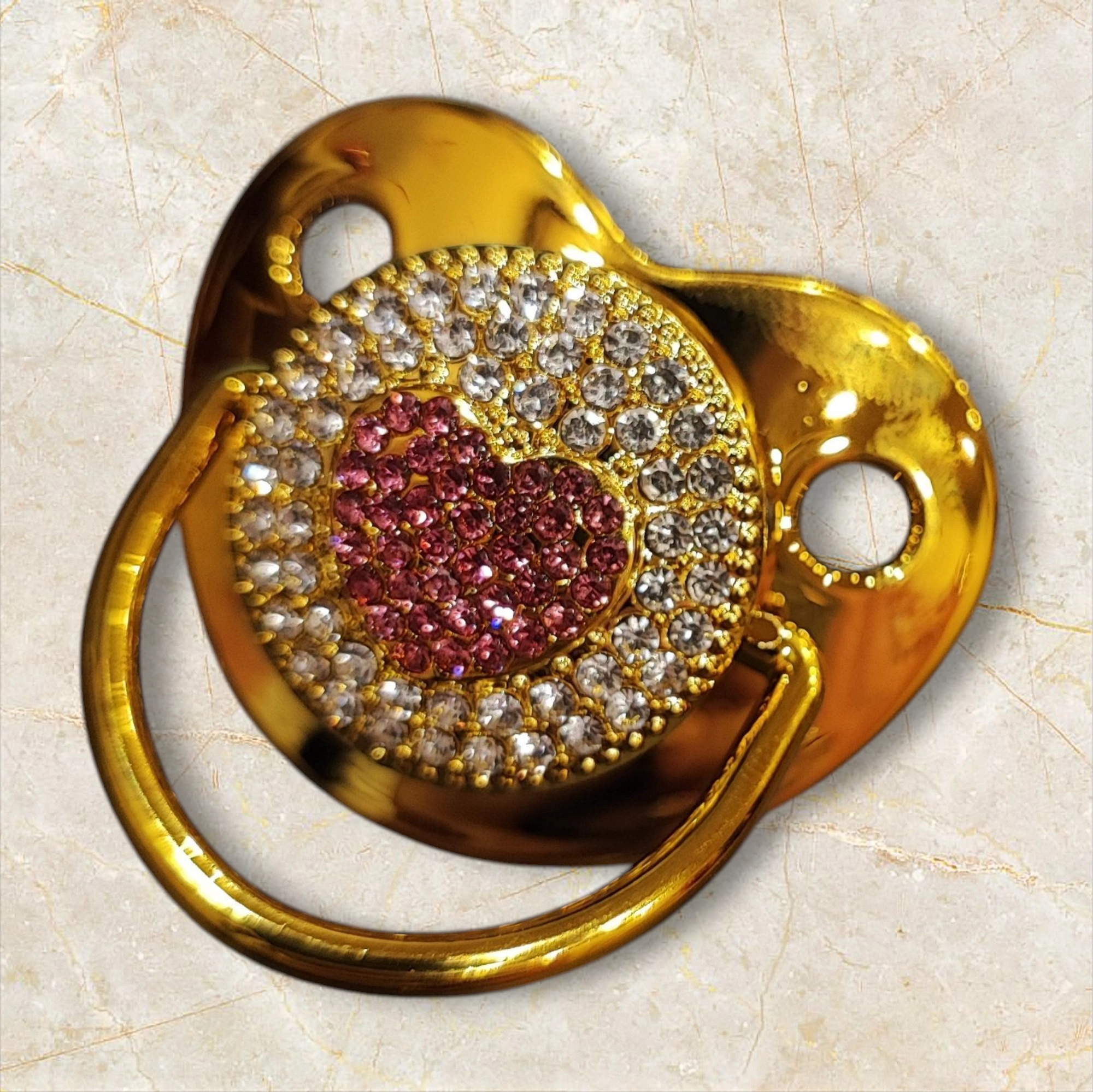 Πιπίλα χρυσή με ροζ καρδιά στρας